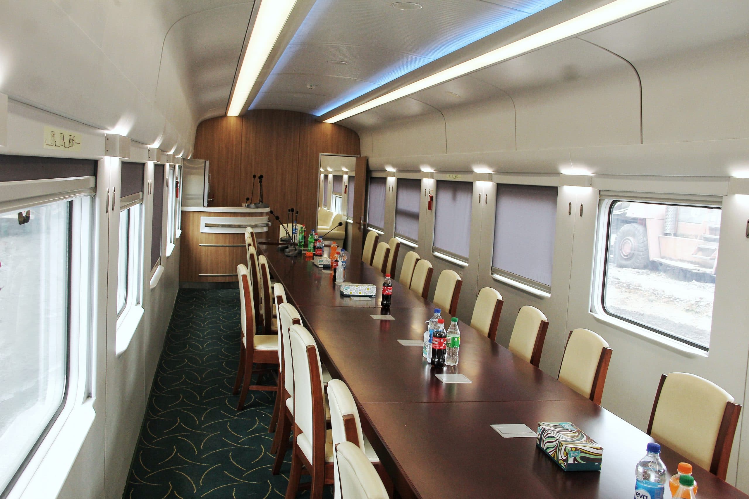 Passengers traveling inside a PiusVirgin excursion train